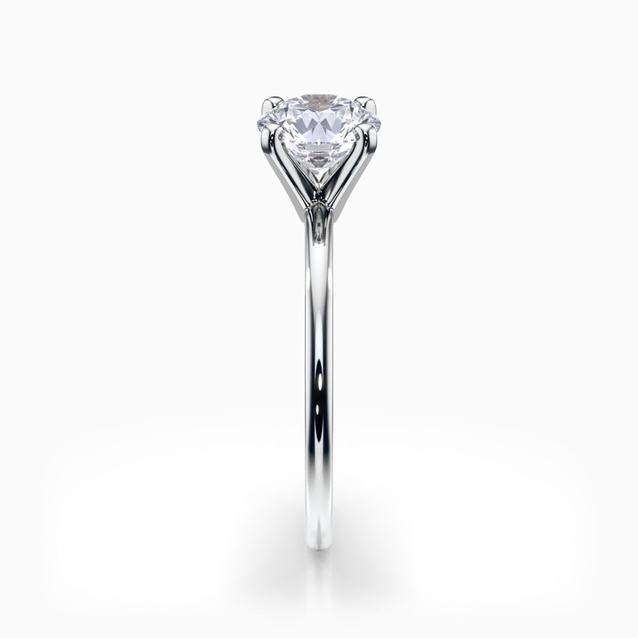 Dainty Solitaire Engagement Ring in White Gold