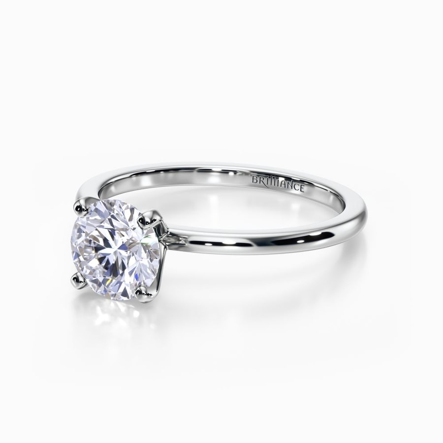 Dainty Solitaire Engagement Ring in White Gold