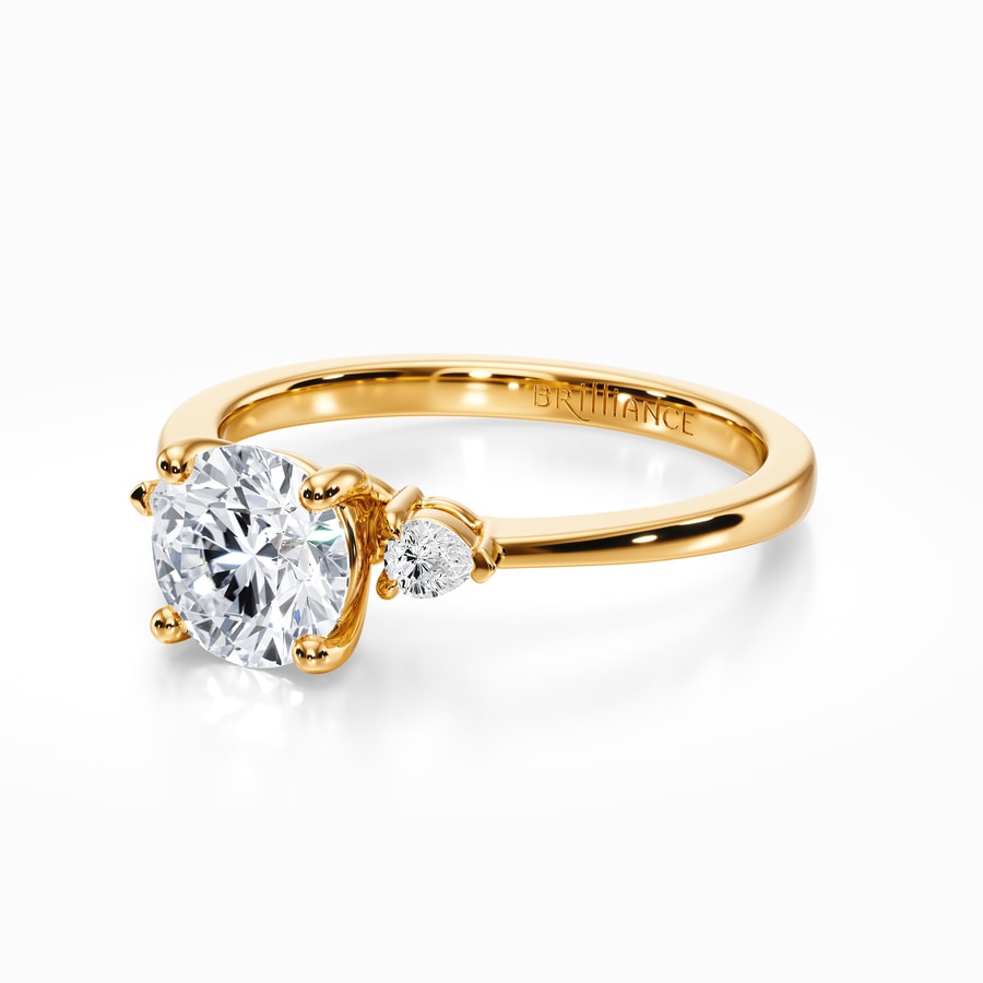 Three-Stone Pear Cut Diamond Ring In Yellow Gold (0.24 Carat)