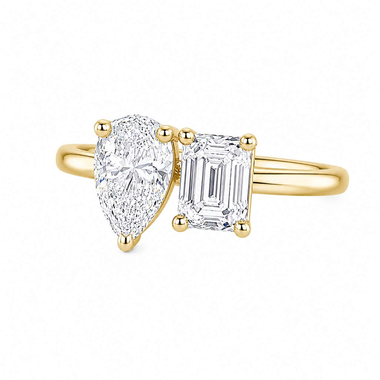 Pear & Emerald Cut Diamond Ring