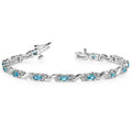 Blue Topaz Bracelet In White Gold With Diamond Accents